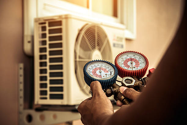 Professional Air Conditioning Service technician working in Loveland, OH